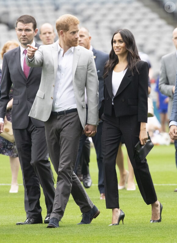 Le prince Harry, duc de Sussex et sa femme Meghan Markle, duchesse de Sussex assistent aux jeux gaélique à Croke Park à Dublin le 11 juillet 2018