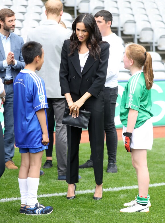 Le prince Harry, duc de Sussex et sa femme Meghan Markle, duchesse de Sussex assistent aux jeux gaélique à Croke Park à Dublin le 11 juillet 2018
