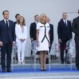 Emmanuel Macron, président de la République, sa femme Brigitte Macron, Edouard Philippe, premier ministre - Défilé militaire du 14 Juillet sur les Champs-Elysées à Paris © Hamilton / Pool / Bestimage
