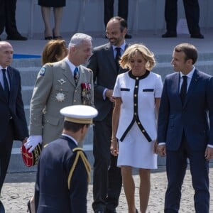 Gérard Collomb, FLorence Parly, François Lecointre, Florence Parly, Edouard Philippe, la première dame Brigitte Macron et le président Emmanuel Macron - Défilé militaire du 14 Juillet sur les Champs-Elysées à Paris © Pierre Perusseau / Bestimage