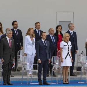 Jean-Yves Le Drian, Marlène Schiappa, Gérard Collomb, Lee Hsien Loong, Mounir Mahjoubi, Nicole Belloubet, Emmanuel Macron, Jacques Mézard, Brigitte Macron, Bruno Lemaire, Edouard Philippe et Taro Kono - Défilé militaire du 14 Juillet sur les Champs-Elysées à Paris © Pierre Perusseau / Bestimage