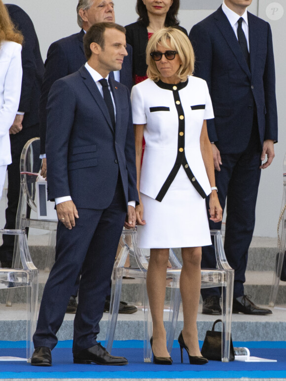 Brigitte Macron et Emmanuel Macron - Défilé militaire du 14 Juillet sur les Champs-Elysées à Paris © Pierre Perusseau / Bestimage