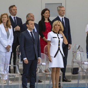 Mounir Mahjoubi, Nicole Belloubet, Jean-Baptiste Lemoyne, Jacques Mézard, Delphine Gény-Stephann, Bruno Le Maire, Brigitte et Emmanuel Macron, Muriel Pénicaud, Edouard Philippe, Stéphane Travert - Défilé militaire du 14 Juillet sur les Champs-Elysées à Paris © Pierre Perusseau / Bestimage