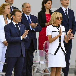 Brigitte Macron et Emmanuel Macron - Défilé militaire du 14 Juillet sur les Champs-Elysées à Paris © Pierre Perusseau / Bestimage