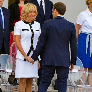 Brigitte Macron et Emmanuel Macron - Défilé militaire du 14 Juillet sur les Champs-Elysées à Paris © Pierre Perusseau / Bestimage