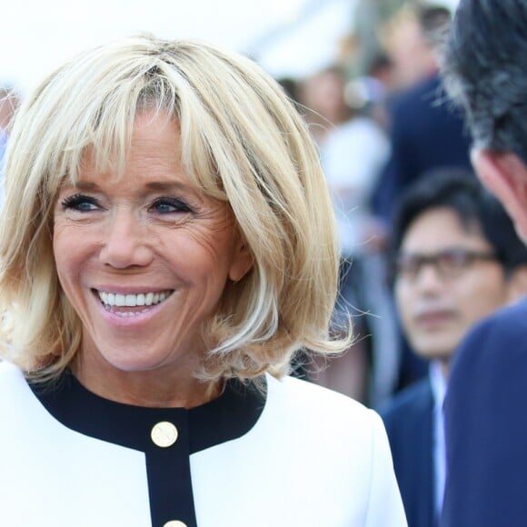 Brigitte Macron , Pierre-Olivier Costa son directeur de cabinet - Le président de la république française assiste au défilé militaire à l'occasion de la Fête nationale, sur les Champs-Elysées à Paris, France. Le 14 juiilet 2018. © Stéphane Lemouton / Bestimage