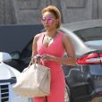 Mel B se rend au palais de justice accompagnée de son meilleur ami G. Madatyan pour une audience concernant son divorce avec son ex-mari S. Belafonte à Los Angeles. L'ancienne Spice Girl porte une robe rose, le 16 juillet 2018.