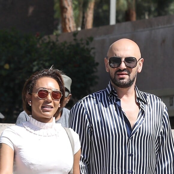 Exclusif - Mel B (Melanie Brown) et son ami Gary Madatyan sortent d'un tribunal à Los Angeles, le 5 juillet 2018