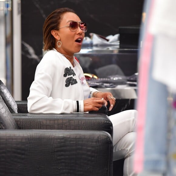 Exclusif - Mel B (Melanie Brown) et son ami Gary Madatyan font du shopping chez Philipp Plein à Los Angeles, le 30 juin 2018