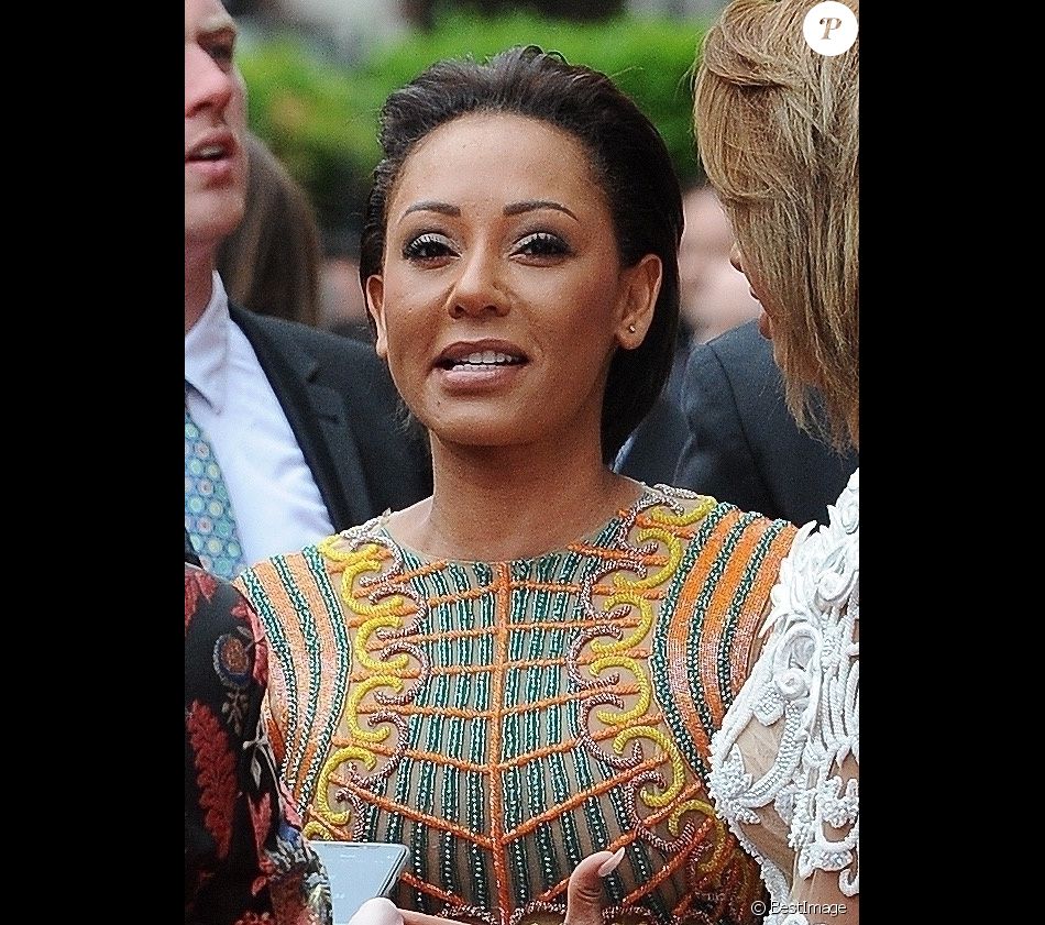 Melanie Brown et sa fille Phoenix Chi Gulzar au photocall des British