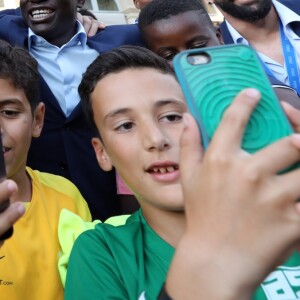 Paul Pogba, Didier Deschamps, N'Golo Kanté et Adil Rami - Le président de la République Française E. Macron et la Première dame B. Macron, accueillent les joueurs de l'équipe de France (Les Bleus) et son sélectionneur D. Deschamps, le président de la Fédération Française de Football N. Le Graët et des membres de la FFF, dans les jardins du Palais de l'Elysée à Paris, le 16 juillet 2018. L'équipe de France a été sacrée Championne du Monde 2018, pour la deuxième fois de son histoire, après sa victoire en finale face à la Croatie (4-2) © Sébastien Valiela/Bestimage