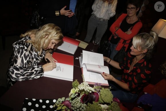 Laeticia Hallyday et Hélène Darroze à Paris en 2014.