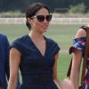 Le prince Harry, duc de Sussex et Meghan Markle, la Duchesse de Sussex arrivent à la Royal Berkshire Polo Cup où le Duc participe aujourd'hui à la Coupe ISP Hanz de Sentebale à Windsor au Royaume-Uni, le 26 juillet 2018.