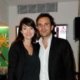 Christophe Michalak et sa compagne Delphine McCarty, à la soirée Mikado King Choco au concept store Colette store, à Paris le 24 mai 2012.