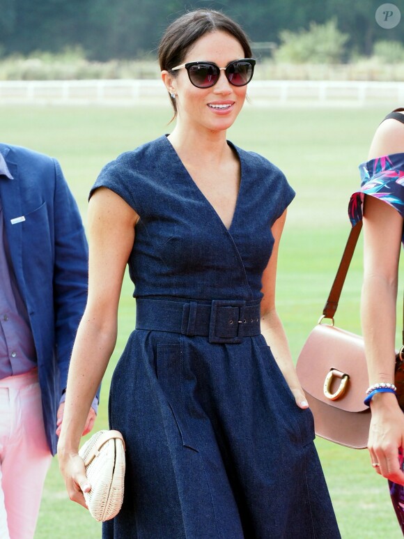 Le prince Harry, duc de Sussex et Meghan Markle, la Duchesse de Sussex arrivent à la Royal Berkshire Polo Cup où le Duc participe aujourd'hui à la Coupe ISP Hanz de Sentebale à Windsor au Royaume-Uni, le 26 juillet 2018.