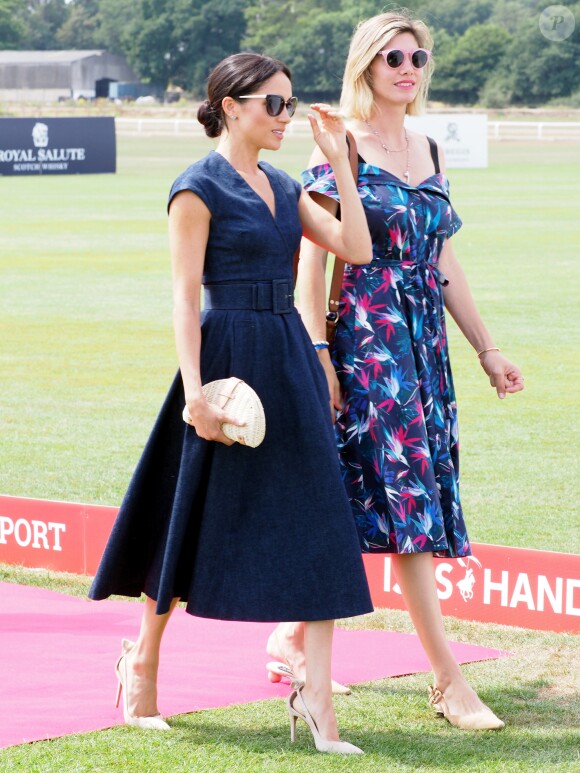 Le prince Harry, duc de Sussex et Meghan Markle, la Duchesse de Sussex arrivent à la Royal Berkshire Polo Cup où le Duc participe aujourd'hui à la Coupe ISP Hanz de Sentebale à Windsor au Royaume-Uni, le 26 juillet 2018.