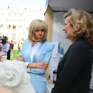 Le président de la République française Emmanuel Macron et sa femme la Première Dame Brigitte Macron (Trogneux) - Le président de la République française et sa femme la Première Dame lors des portes ouvertes au palais de l'Elysee à l'occasion des Journées Européennes du Patrimoine à Paris, France, le 15 septembre 2018. © Hamilton/Pool/Bestimage