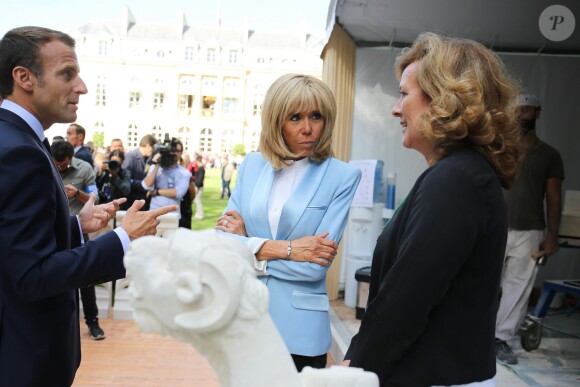 Le président de la République française Emmanuel Macron et sa femme la Première Dame Brigitte Macron (Trogneux) - Le président de la République française et sa femme la Première Dame lors des portes ouvertes au palais de l'Elysee à l'occasion des Journées Européennes du Patrimoine à Paris, France, le 15 septembre 2018. © Hamilton/Pool/Bestimage