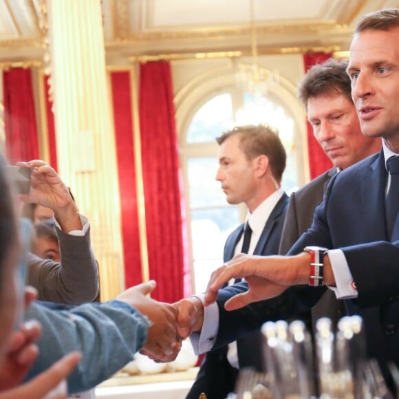 Le président de la République française Emmanuel Macron et sa femme la Première Dame Brigitte Macron (Trogneux) - Le président de la République française et sa femme la Première Dame lors des portes ouvertes au palais de l'Elysee à l'occasion des Journées Européennes du Patrimoine à Paris, France, le 15 septembre 2018. © Hamilton/Pool/Bestimage