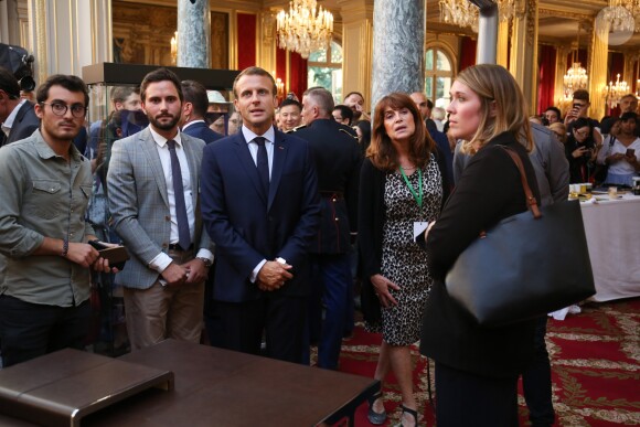 Le président de la République française Emmanuel Macron et sa femme la Première Dame Brigitte Macron (Trogneux) - Le président de la République française et sa femme la Première Dame lors des portes ouvertes au palais de l'Elysee à l'occasion des Journées Européennes du Patrimoine à Paris, France, le 15 septembre 2018. © Hamilton/Pool/Bestimage