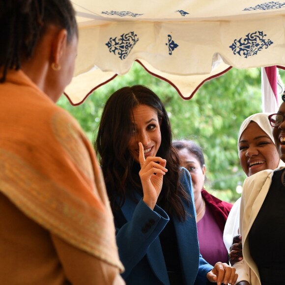 Meghan Markle, duchesse de Sussex, recevait le 20 septembre 2018 au palais de Kensington, en compagnie de son mari le prince Harry et de sa mère Doria Ragland, les femmes de la cuisine communautaire Hubb Community Kitchen pour un événement pour le lancement du livre de recettes "Together, our community cookbook" qu'elle a préfacé.