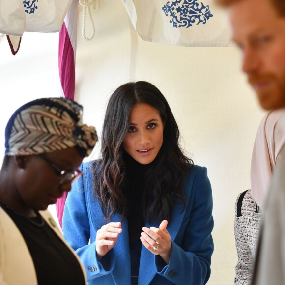 Meghan Markle, duchesse de Sussex, recevait le 20 septembre 2018 au palais de Kensington, en compagnie de son mari le prince Harry et de sa mère Doria Ragland, les femmes de la cuisine communautaire Hubb Community Kitchen pour un événement pour le lancement du livre de recettes "Together, our community cookbook" qu'elle a préfacé.