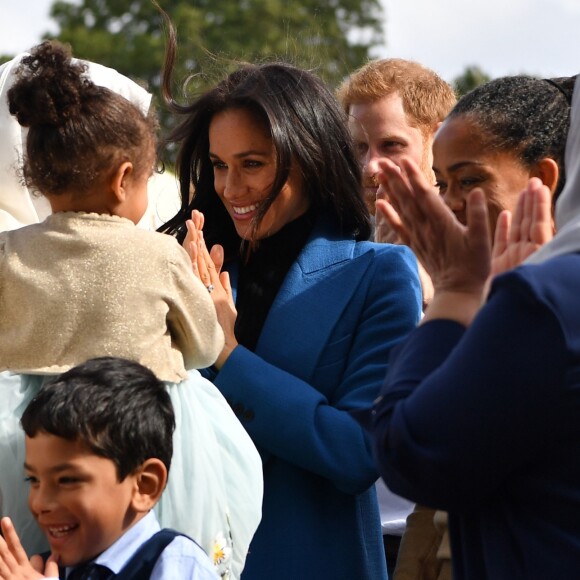 Meghan Markle, duchesse de Sussex, recevait le 20 septembre 2018 au palais de Kensington, en compagnie de son mari le prince Harry et de sa mère Doria Ragland, les femmes de la cuisine communautaire Hubb Community Kitchen pour un événement pour le lancement du livre de recettes "Together, our community cookbook" qu'elle a préfacé.