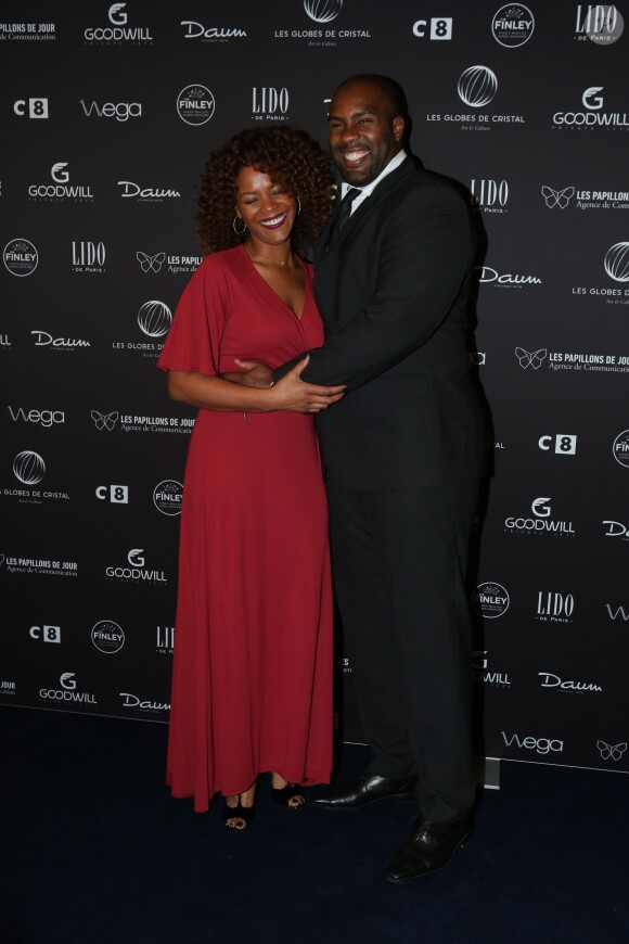 Teddy Riner et sa compagne Luthna Plocus au photocall de la 11ème cérémonie des Globes de Cristal au Lido à Paris le 30 janvier 2017. © CVS / Bestimage