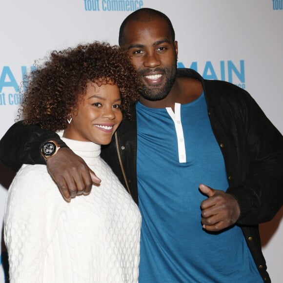 Teddy Riner et sa compagne Luthna lors de l'avant-première du film "Demain tout commence" au Grand Rex à Paris le 28 novembre 2016.