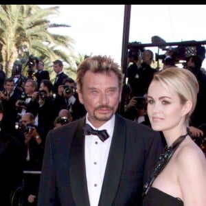 Johnny et Laeticia Hallyday lors de la cérémonie de clôture du 52e festival de Cannes le 23 mai 1999.