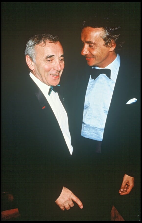 Charles Aznavour et Michel Sardou à l'Opéra de Paris le 24 avril 1989.