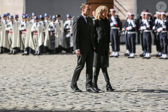 Emmanuel Macron, président de la République, et sa femme la première dame Brigitte Macron - Hommage national à Charles Aznavour à l'Hôtel des Invalides à Paris le 5 octobre 2018. © Hamilton / Pool / Bestimage