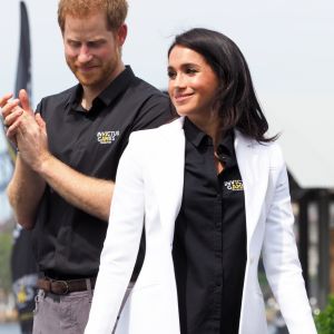 Le prince Harry, duc de Sussex, et Meghan Markle, duchesse de Sussex, enceinte, assistent au "Jaguar Land Rover Driving Challenge" en ouverture des "Invictus Games 2018" sur Cockatoo Island. Sydney, le 20 octobre 2018.