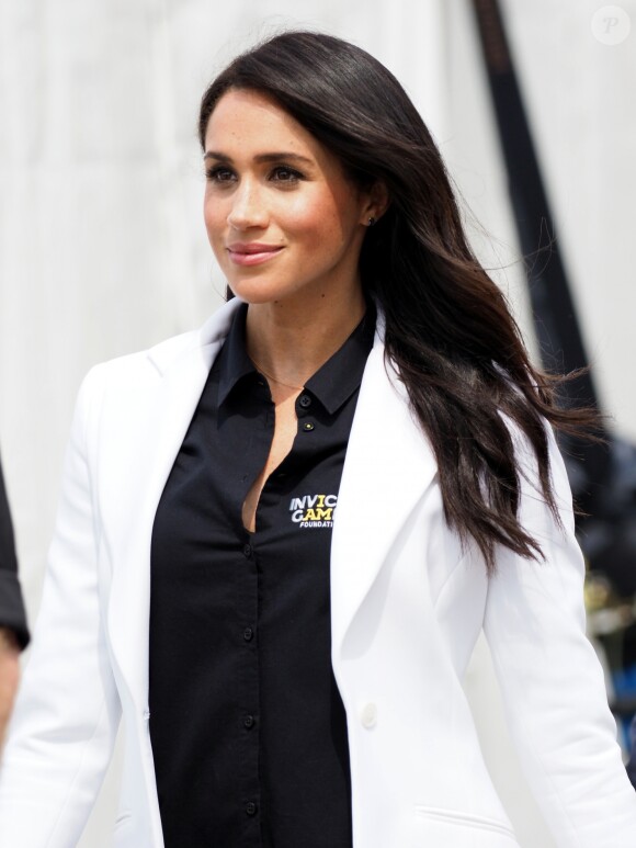 Le prince Harry, duc de Sussex, et Meghan Markle, duchesse de Sussex, enceinte, assistent au "Jaguar Land Rover Driving Challenge" en ouverture des "Invictus Games 2018" sur Cockatoo Island. Sydney, le 20 octobre 2018.