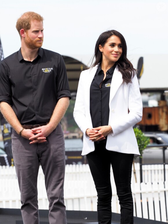 Le prince Harry, duc de Sussex, et Meghan Markle, duchesse de Sussex, enceinte, assistent au "Jaguar Land Rover Driving Challenge" en ouverture des "Invictus Games 2018" sur Cockatoo Island. Sydney, le 20 octobre 2018.