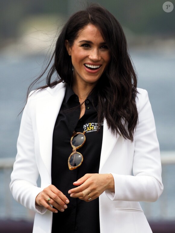 Le prince Harry, duc de Sussex, et Meghan Markle, duchesse de Sussex, enceinte, assistent au "Jaguar Land Rover Driving Challenge" en ouverture des "Invictus Games 2018" sur Cockatoo Island. Sydney, le 20 octobre 2018.