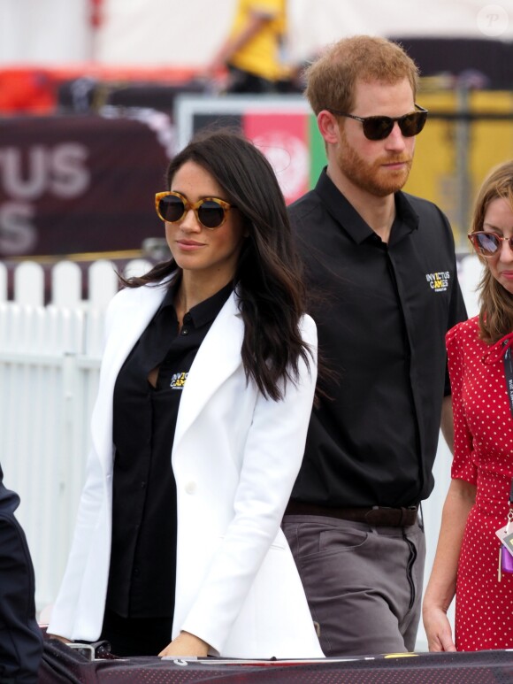 Le prince Harry, duc de Sussex, et Meghan Markle, duchesse de Sussex, enceinte, assistent au "Jaguar Land Rover Driving Challenge" en ouverture des "Invictus Games 2018" sur Cockatoo Island. Sydney, le 20 octobre 2018.