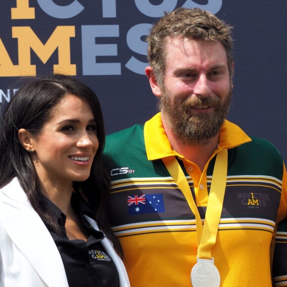 Le prince Harry, duc de Sussex, et Meghan Markle, duchesse de Sussex, enceinte, assistent au "Jaguar Land Rover Driving Challenge" en ouverture des "Invictus Games 2018" sur Cockatoo Island. Sydney, le 20 octobre 2018.