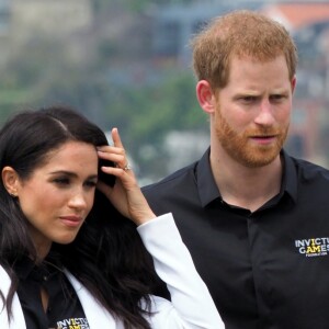 Le prince Harry, duc de Sussex, et Meghan Markle, duchesse de Sussex, enceinte, assistent au "Jaguar Land Rover Driving Challenge" en ouverture des "Invictus Games 2018" sur Cockatoo Island. Sydney, le 20 octobre 2018.