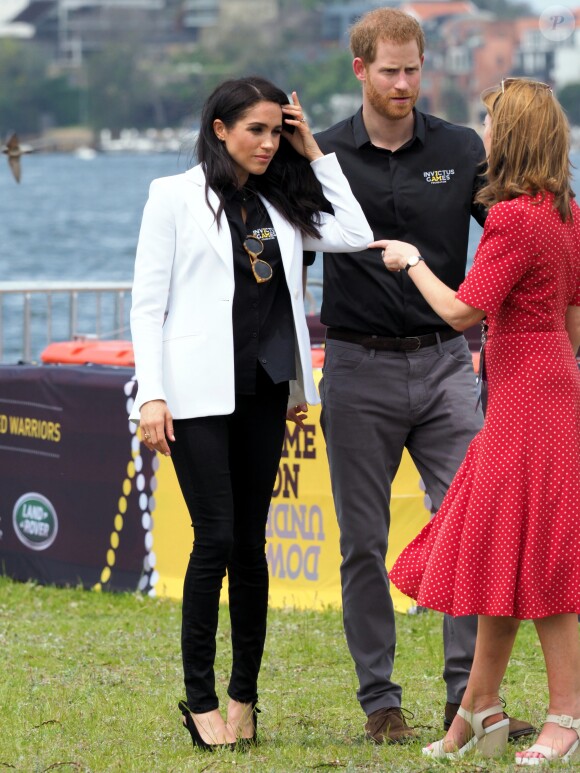 Le prince Harry, duc de Sussex, et Meghan Markle, duchesse de Sussex, enceinte, assistent au "Jaguar Land Rover Driving Challenge" en ouverture des "Invictus Games 2018" sur Cockatoo Island. Sydney, le 20 octobre 2018.