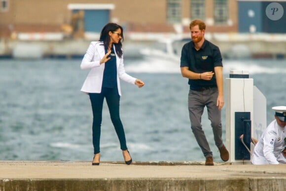 Le prince Harry, duc de Sussex, et Meghan Markle, duchesse de Sussex, enceinte, retournent à l'Admiralty House après leur visite sur Cockatoo Island pour assister au "Jaguar Land Rover Driving Challenge" en ouverture des "Invictus Games 2018". Sydney, le 20 octobre 2018.