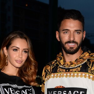 Nabilla Benattia et son compagnon Thomas Vergara - Arrivées des people au défilé Versace - Collection Prêt-à-Porter Printemps/Eté 2019" lors de la Fashion Week de Milan (MLFW) le 21 septembre 2018