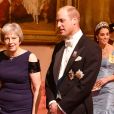La première Ministre du Royaume-Uni, Theresa May et Le prince William, duc de Cambridge - Les souverains néerlandais assistent à un banquet d'Etat au palais de Buckingham de Londres, lors de leur visite d'État au Royaume-Uni, le 23 octobre 2018.