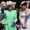 Le prince Charles, la duchesse Camilla et la duchesse Meghan (Meghan Markle) le 22 mai 2018 lors d'une des fameuses garden parties de Buckingham Palace, à Londres.
