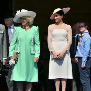 Le prince Charles, la duchesse Camilla et la duchesse Meghan (Meghan Markle) le 22 mai 2018 lors d'une des fameuses garden parties de Buckingham Palace, à Londres.