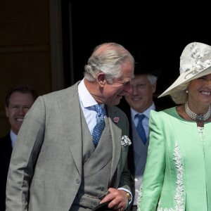 Le prince Charles, la duchesse Camilla et la duchesse Meghan (Meghan Markle) le 22 mai 2018 lors d'une des fameuses garden parties de Buckingham Palace, à Londres.