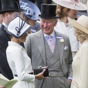 Meghan Markle, duchesse de Sussex, le prince Charles et Camilla Parker Bowles, duchesse de Cornouailles, lors du Royal Ascot 2018 à l'hippodrome d'Ascot dans le Berkshire le 19 juin 2018