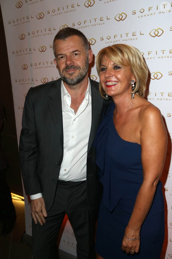 Eric Naulleau et sa femme Veronika à la soiree d'inauguration de l'hotel Sofitel Paris Arc de Triomphe au 14 Rue Beaujon a Paris le 18 septembre 2013.