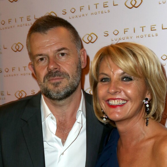 Eric Naulleau et sa femme Veronika à la soiree d'inauguration de l'hotel Sofitel Paris Arc de Triomphe au 14 Rue Beaujon a Paris le 18 septembre 2013.