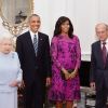 La reine Elizabeth II et le duc d'Edimbourg recevant Barack et Michelle Obama le 22 avril 2016 au château de Windsor à l'occasion des 90 ans de la souveraine.